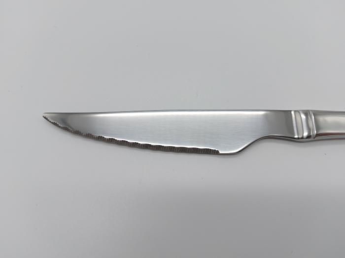 Нож столовый для стейка и мяса с зубцами нержавейка Элит L 21,5 cm в упаковке 12 штук из нержавеющей стали 12592 фото